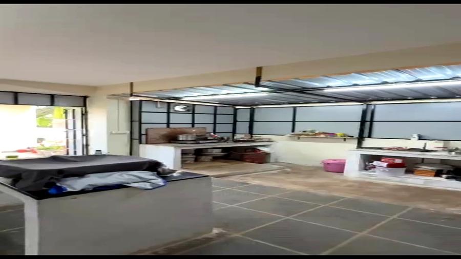 Kitchen interior with cooking area and storage