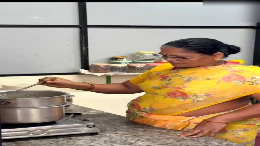 Cook stirring fresh meal in kitchen