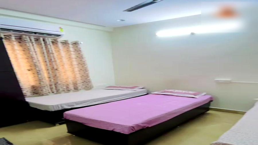 Double sharing room with AC and curtains