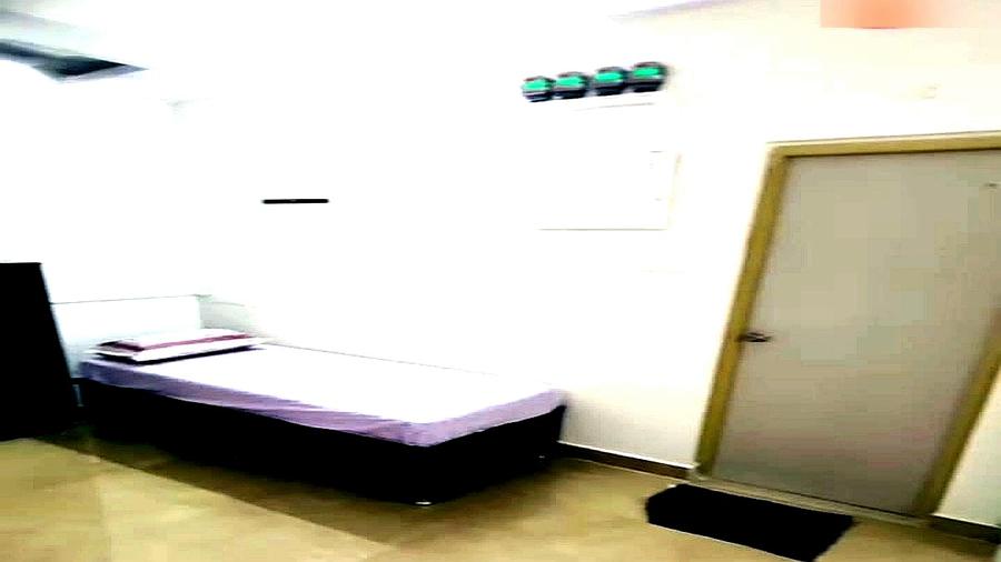 Room interior with bed and power backup